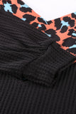 Top in maglia colorblock con patchwork leopardato