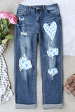 Jeans in denim larghi strappati con stampa a cuore da donna