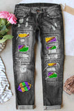 Mardi Gras Jeans strappati con stampa labbra multicolori