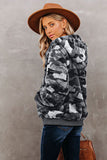 Cappotto da donna con cappuccio e zip in pile con motivo mimetico e tasche