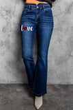 Jeans svasati a vita alta con stampa margherita