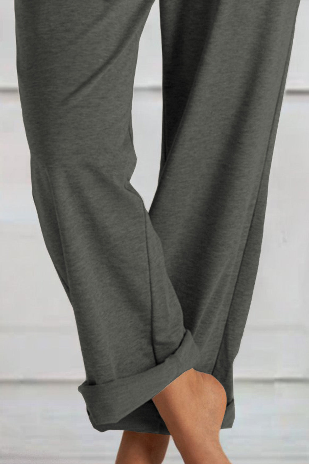 Pantaloni in maglia cachi larghi con coulisse in vita con tasche