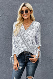 Sheer Snakeskin Top With Knotted Long Sleeves and Curved Hem