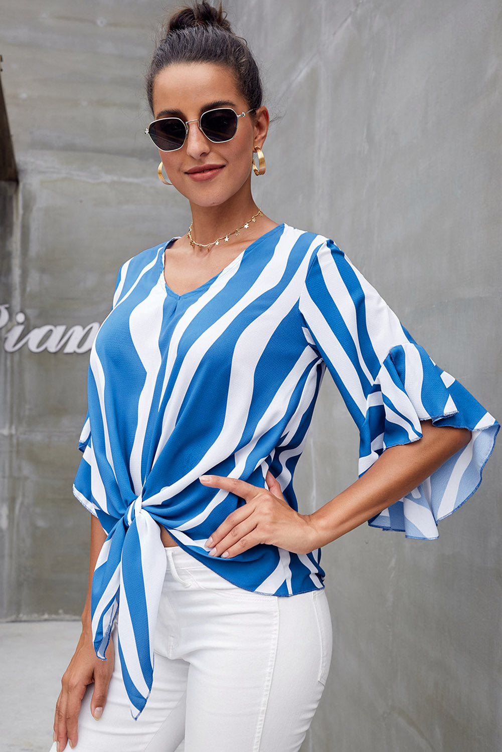 Top da donna a righe blu e bianche avvolgenti con fiocco in stile europeo