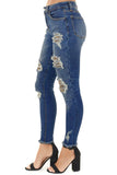 Jeans skinny lavati blu scuro con stampa leopardata consumata